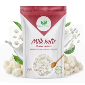 Pouch of Natural Probio milk kefir grains starter culture with live grains and a milk splash